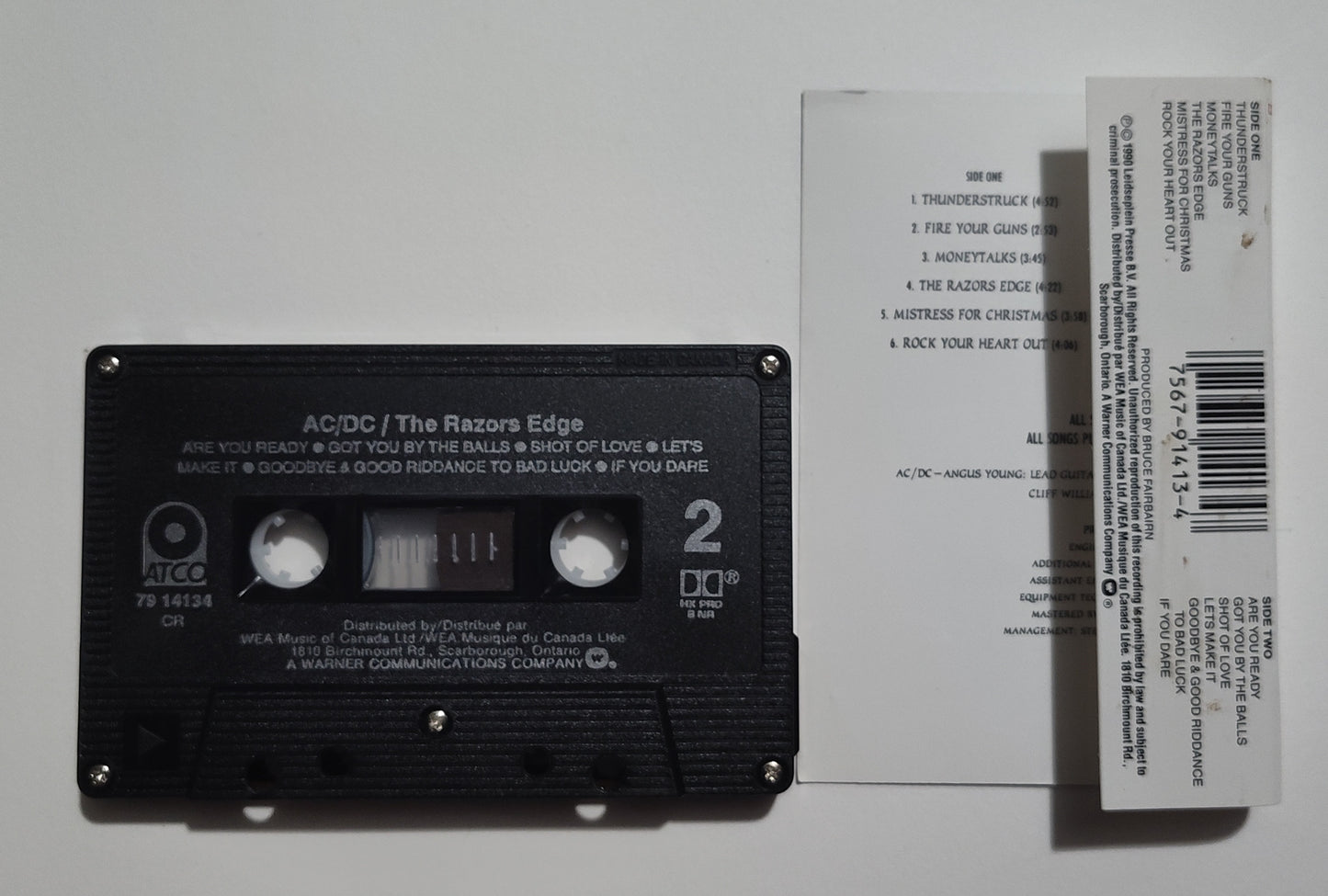 AC/DC - "The Razor's Edge" - CASSETTE TAPE (Canada; black shell; DOLBY HX PRO; B NR) VG/VG+
