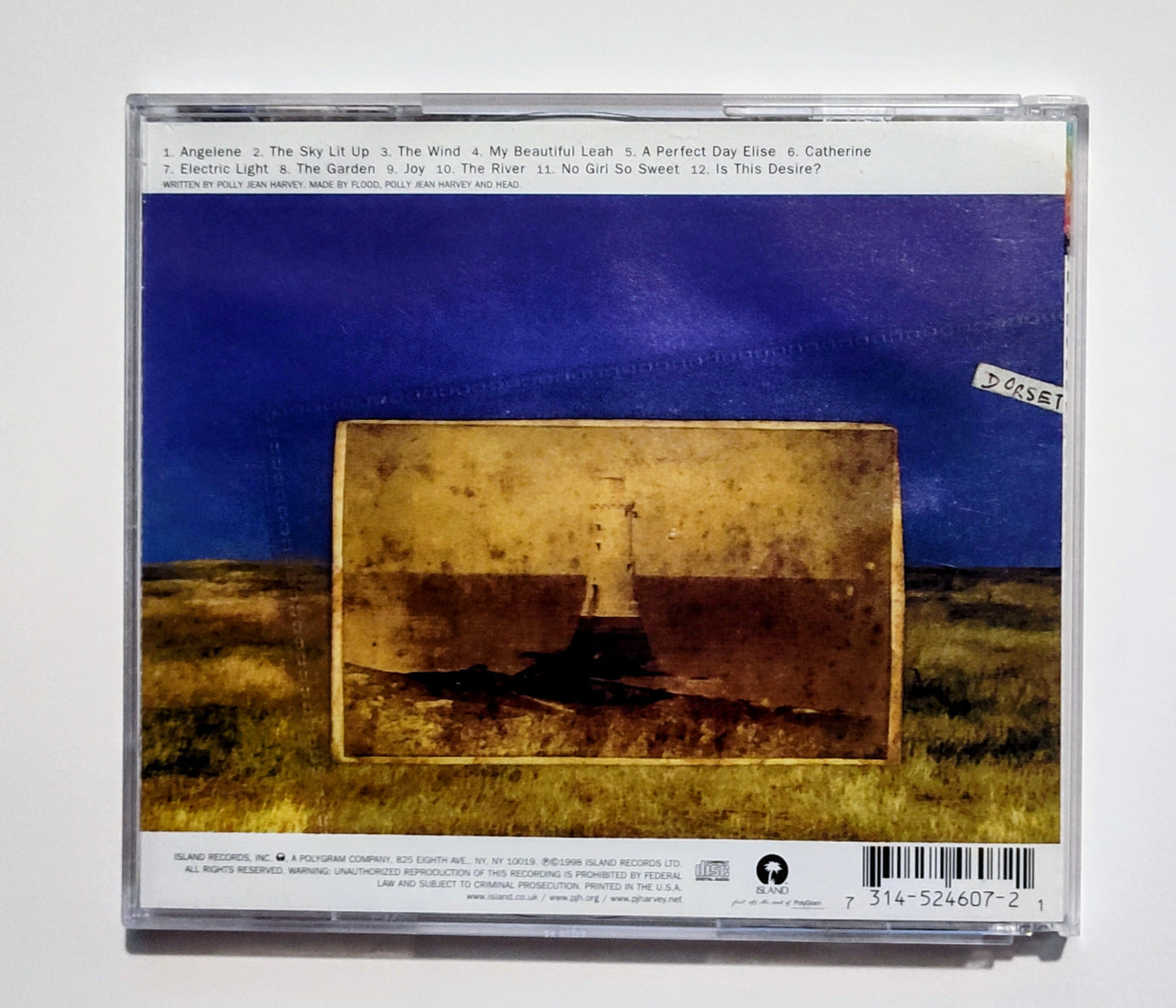P.J. Harvey - "Is This Desire?" - COMPACT DISC (2x) VG+/VG+