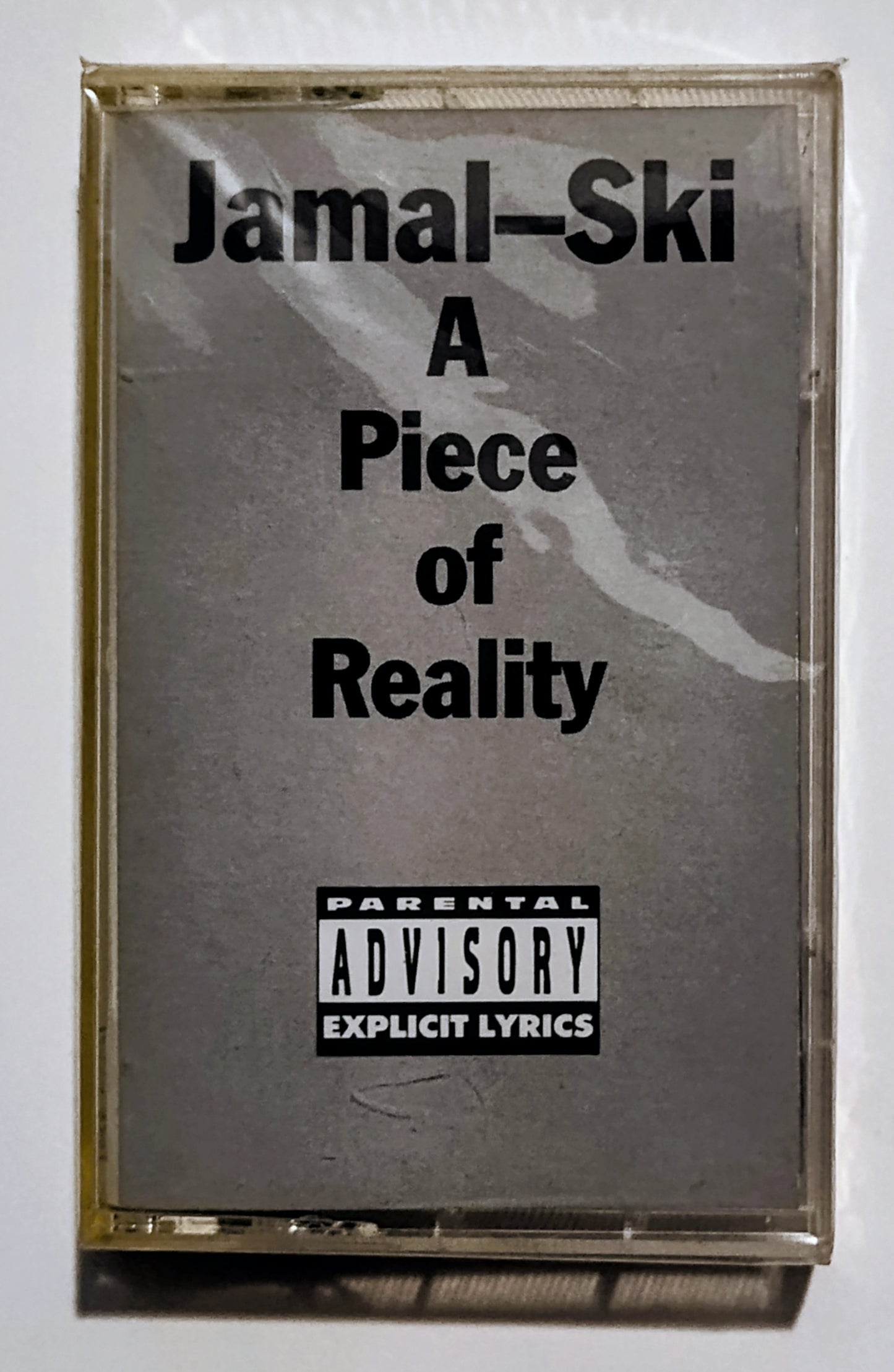 Jamal-ski - "A Piece Of Reality" - CASSETTE TAPE (Maxi) NM/M (Sealed; Lightstruck spine)