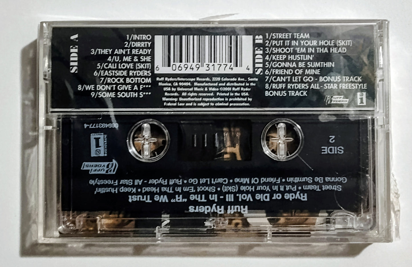 Ruff Ryders - "Ride Or Die Vol. III-In The 'R' We Trust" - CASSETTE TAPE VG+/M (Sealed with hype sticker; tiny tear in seal on spine; 1 cm crack/break on bottom of case cover)