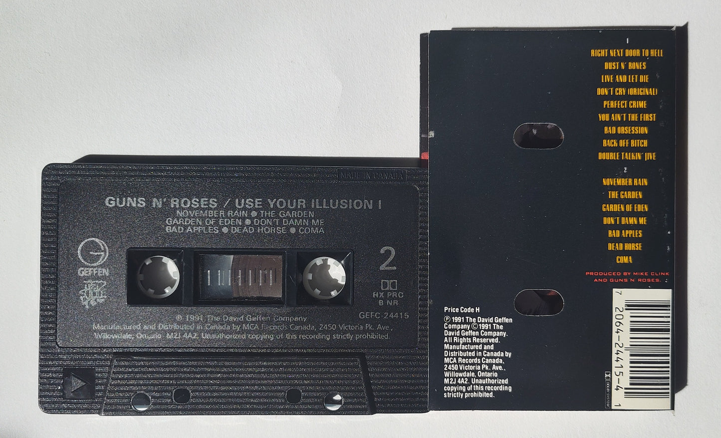 Guns N' Roses - "Use Your Illusion I" - CASSETTE TAPE (Canada; black shell; DOLBY HX PRO B NR) VG+/VG+