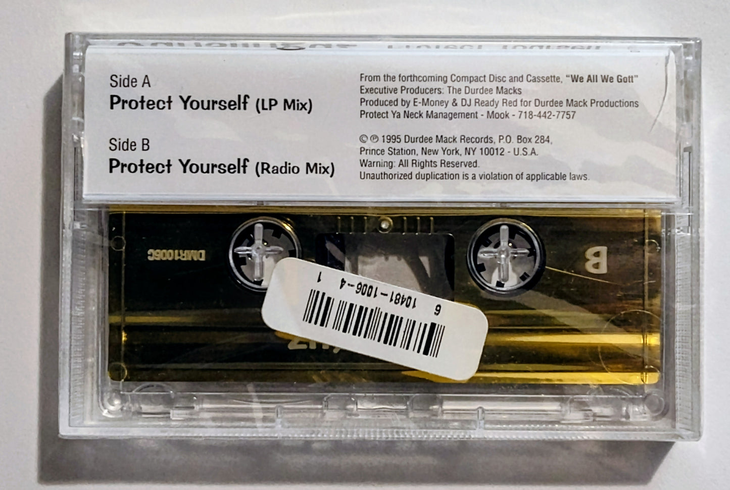 Gunslinguz - "Protect Yourself" - CASSETTE TAPE NM/M (Sealed; cracked back of case)
