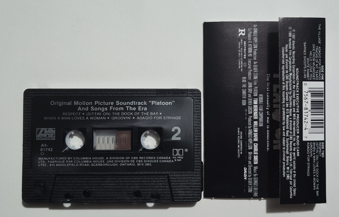 Various Artists - "Platoon Motion Picture Soundtrack And Songs From The Era" - CASSETTE TAPE (Canada; black shell; DOLBY HX PRO B NR) VG+/VG+