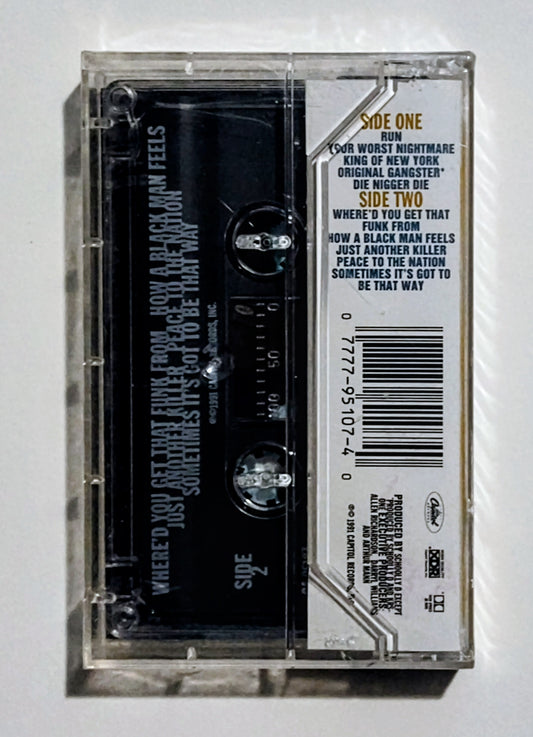 Schooly D - "How A Blackman Feels" - CASSETTE TAPE (XDR; DOLBY HX PRO B NR) VG+/M (Sealed w/drill hole thru spine)