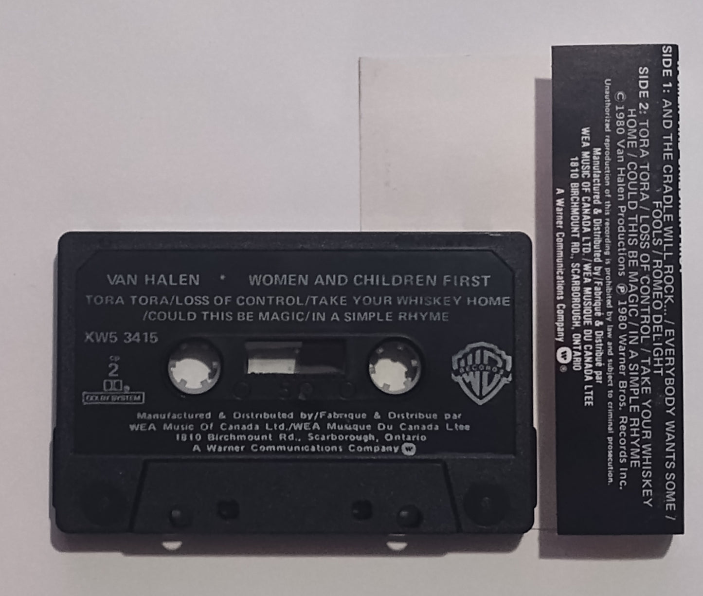 Van Halen - "Women And Children First - CASSETTE TAPE (Canada; Black shell; DOLBY) VG/VG+