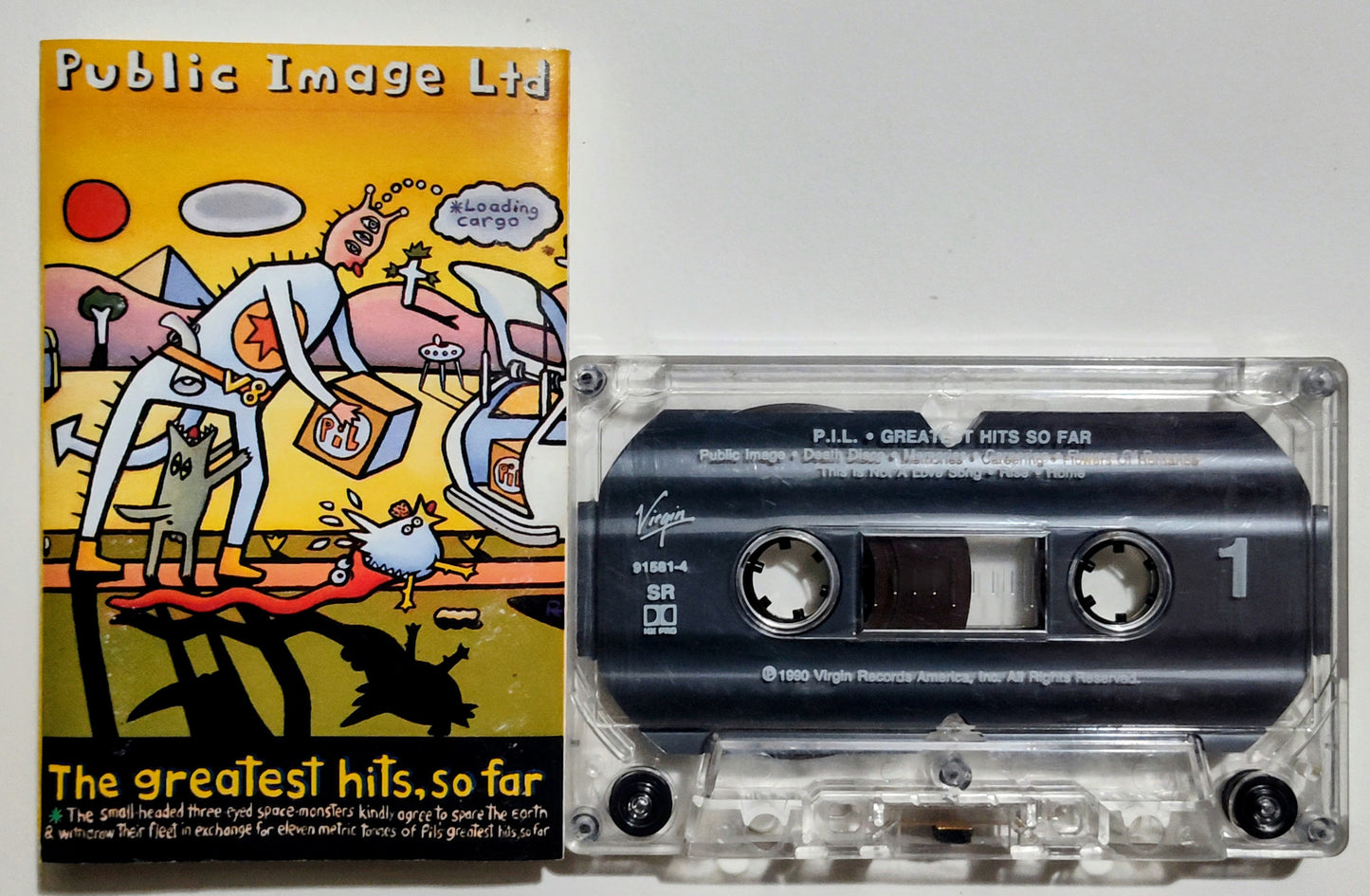 Public Image Ltd (PIL) - "The Greatest Hits, So Far" - CASSETTE TAPE (SR; DOLBY HX PRO) VG+/G+ (Cracked shell)