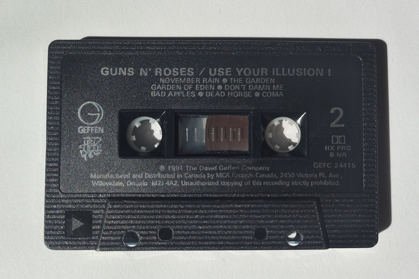 Guns N' Roses - "Use Your Illusion I" - CASSETTE TAPE (Canada; black shell; DOLBY HX PRO B NR) VG+/VG+