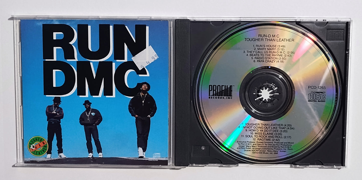 Run-D.M.C. - "Tougher Than Leather" - COMPACT DISC G+/VG+ (Hole Punch)