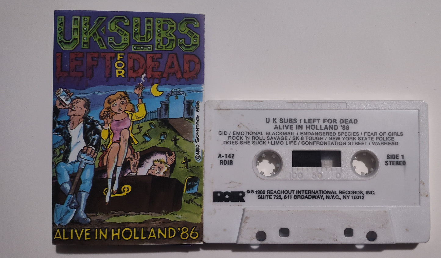 UK Subs - "Left For Dead: Live In Holland '86" - CASSETTE TAPE (Stereo) VG/G+