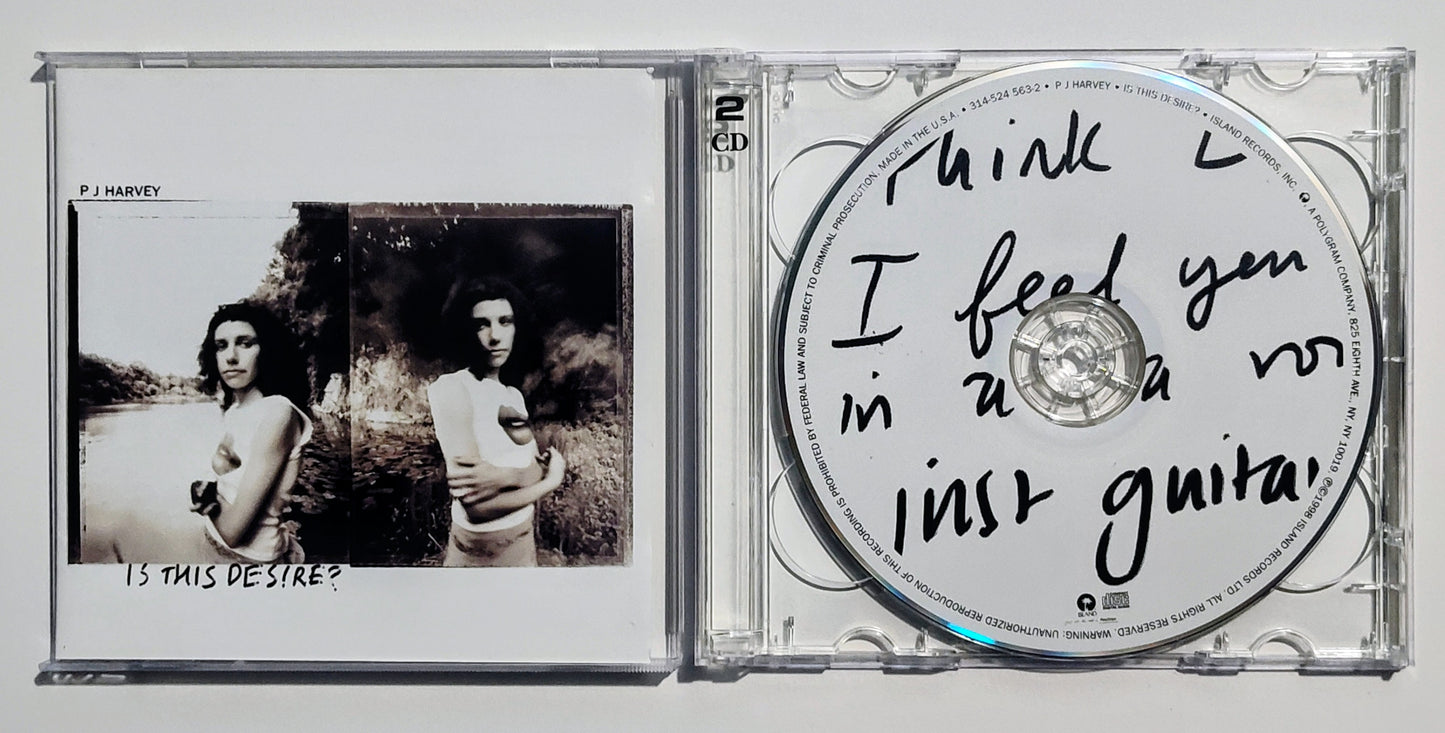 P.J. Harvey - "Is This Desire?" - COMPACT DISC (2x) VG+/VG+