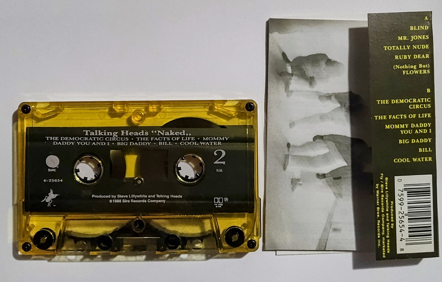 Talking Heads - "Naked" - CASSETTE TAPE (DOLBY HX PRO B NR; Yellow Translucent Shell) VG+/VG