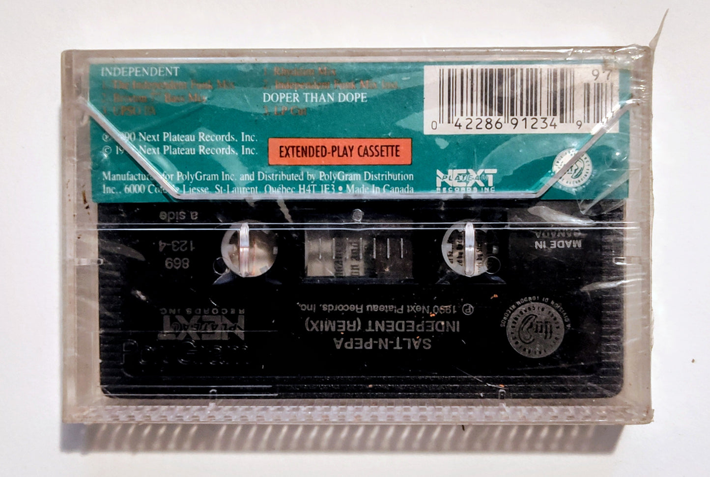 Salt 'N' Pepa - "Independent Remix" - CASSETTE TAPE (Canada; black shell) VG+/M (Sealed; broken seal; drill hole thru spine)