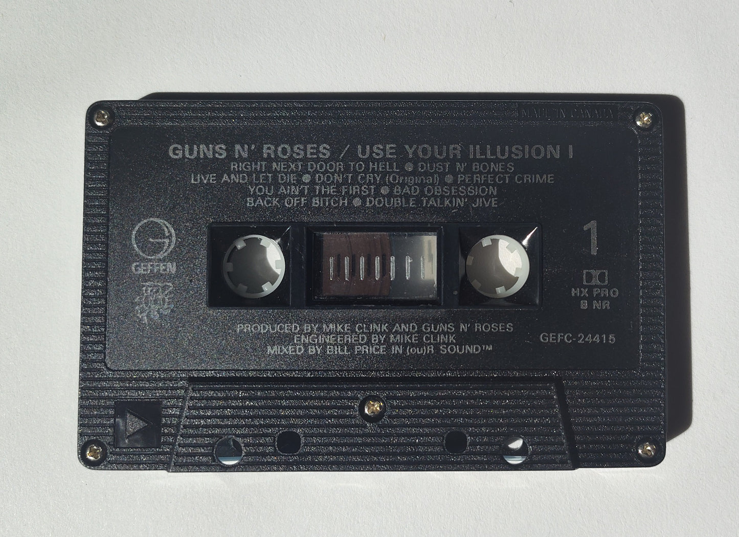 Guns N' Roses - "Use Your Illusion I" - CASSETTE TAPE (Canada; black shell; DOLBY HX PRO B NR) VG+/VG+