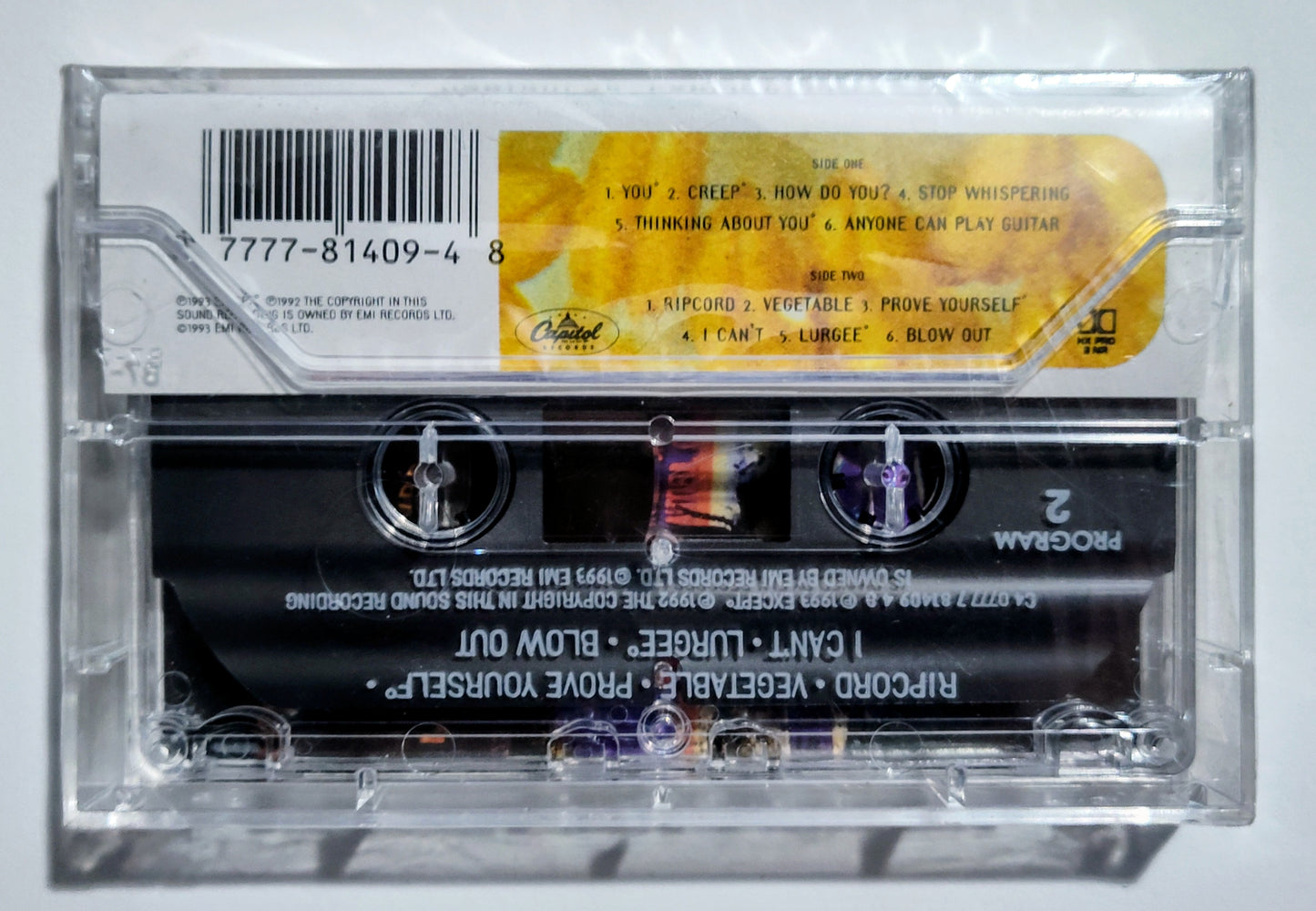 Radiohead - "Pablo Honey" - CASSETTE TAPE (DOLBY HX PRO) NM/M (Sealed w/ hype sticker; Drill hole in upper spine; scratchy cellophane)