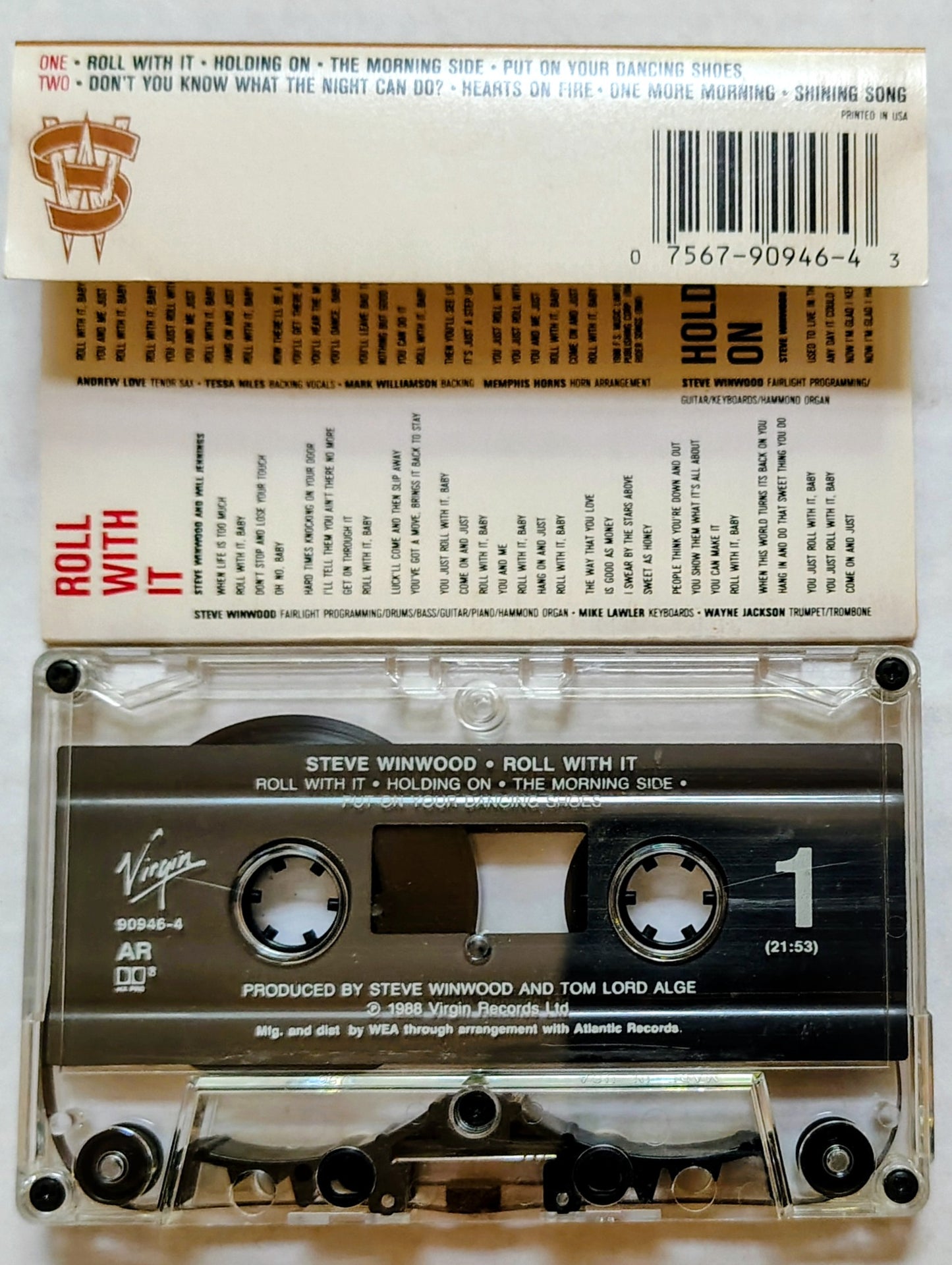 Steve Winwood - Roll With It