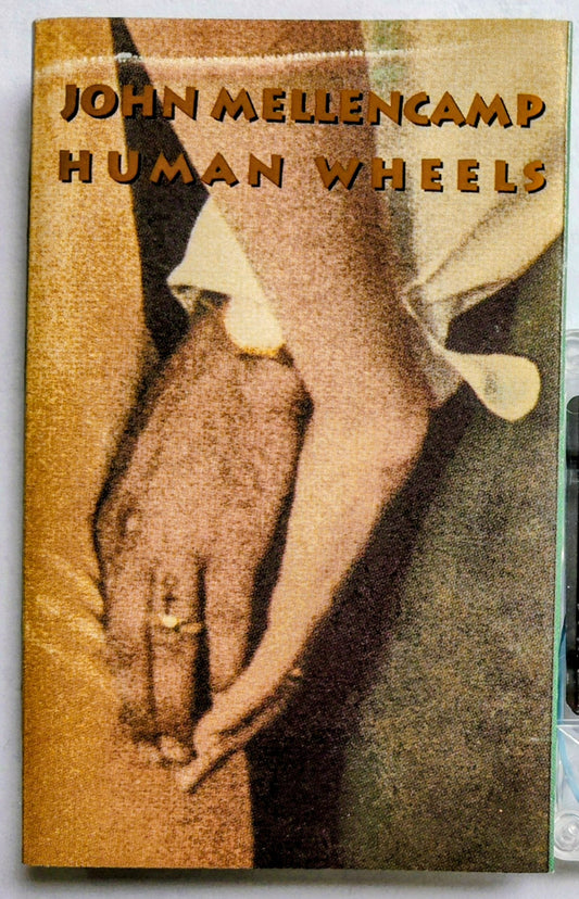 John Mellencamp - “Human Wheels” - CASSETTE TAPE VG+/VG+