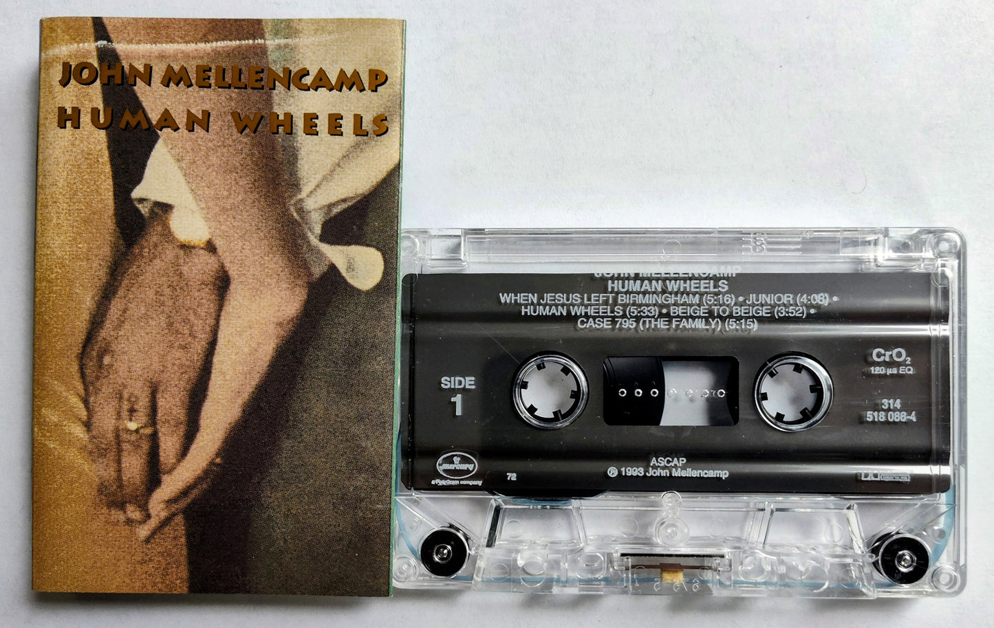 John Mellencamp - “Human Wheels” - CASSETTE TAPE VG+/VG+