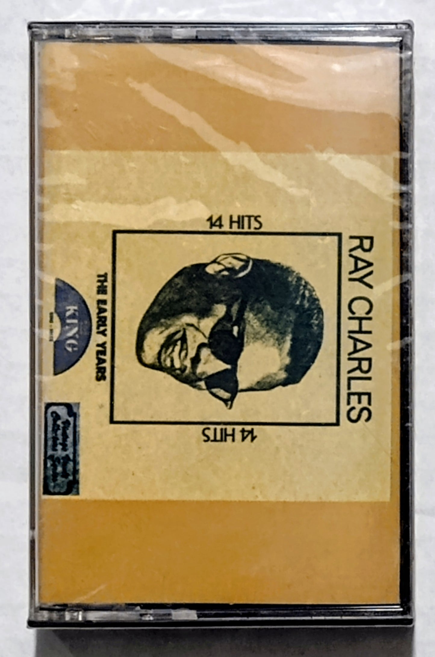 Ray Charles - “14 Original Greatest Hits” - CASSETTE TAPE VG+/M (Sealed with small drill hole through spine)