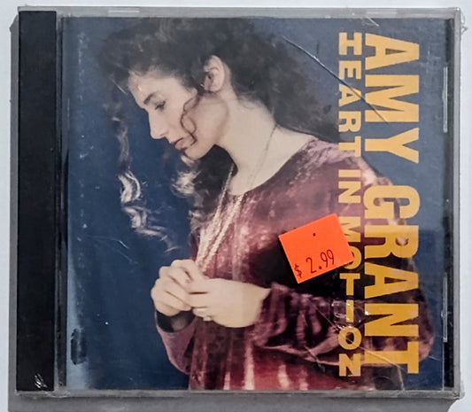 Amy Grant - “Heart In Motion” - COMPACT DISC VG+/M (Sealed; cracked case)