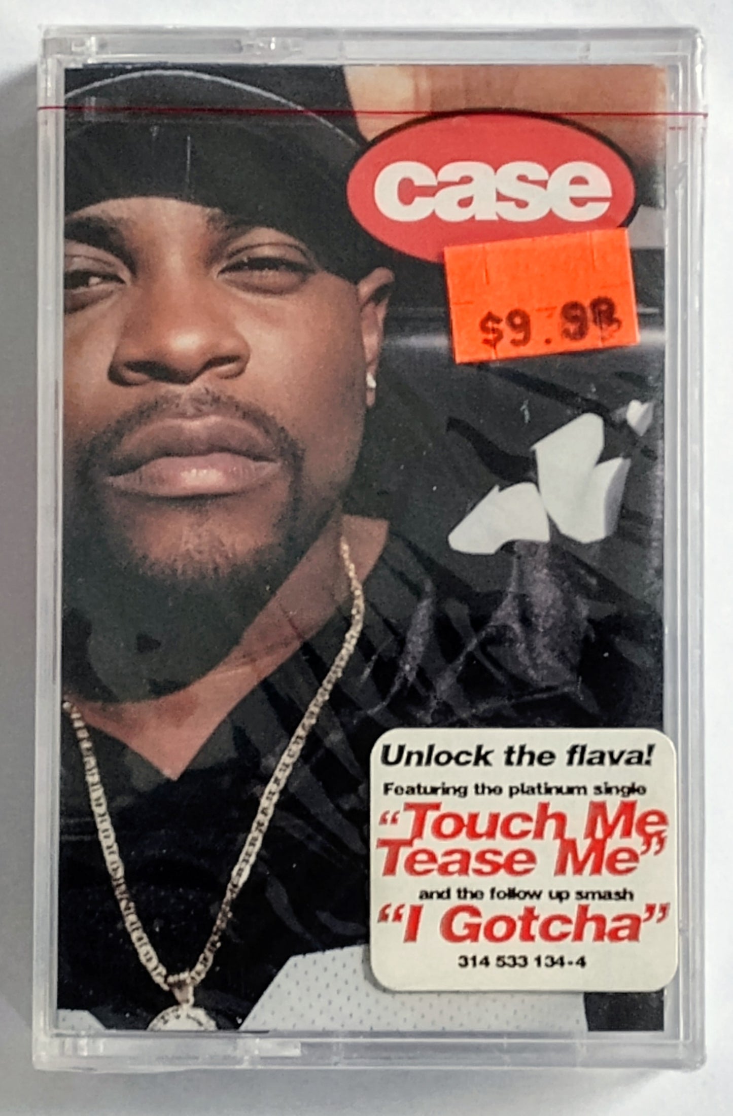 Case - “Case” - CASSETTE TAPE (Canada; clear case) VG+/M (Sealed with hype sticker; Cracked case)