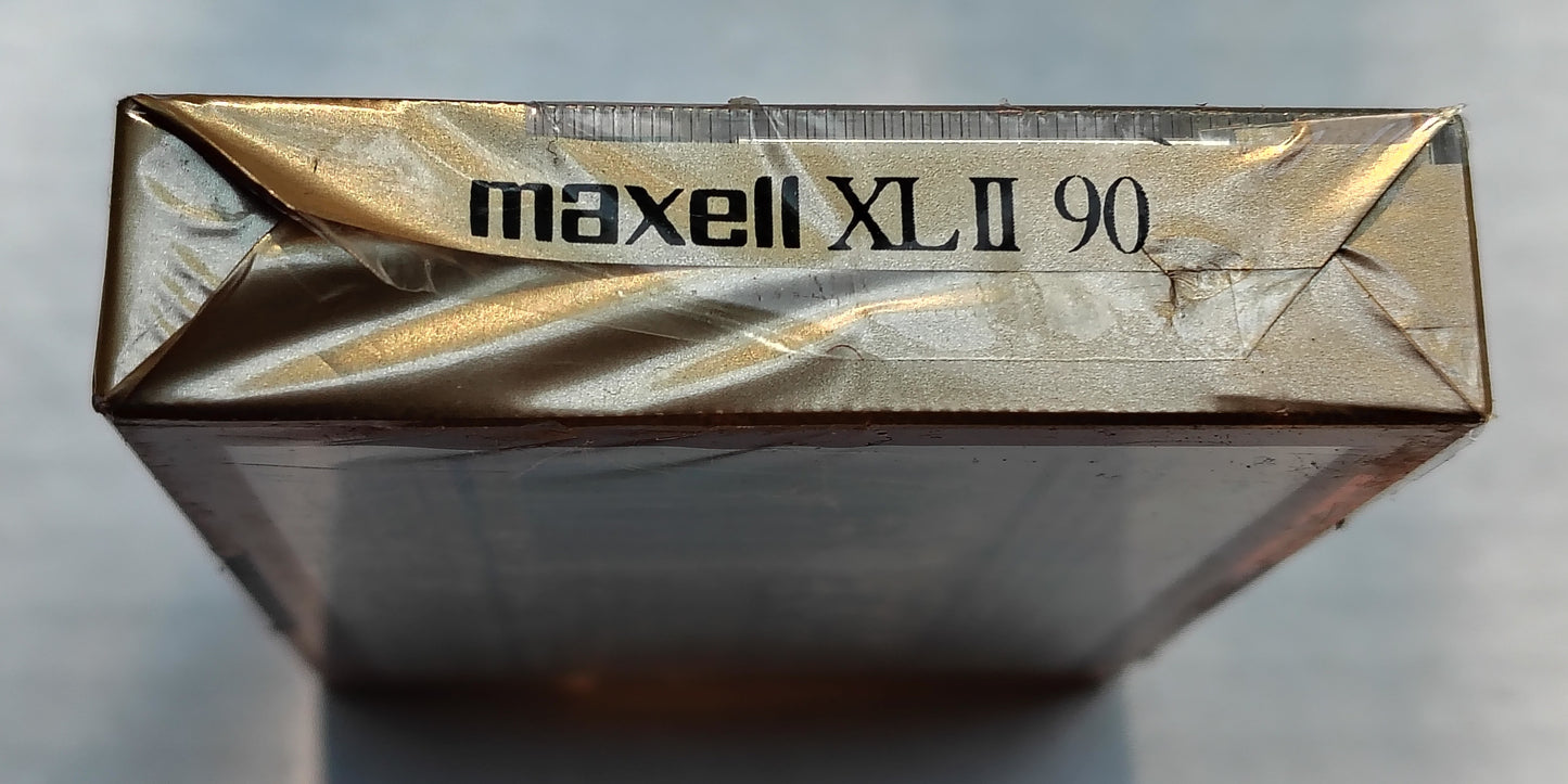 Blank - Maxell XL II Chrome (90-Minute; Unique Vintage style; Wide window/black shell; Sealed; slightly ripped cellophane)