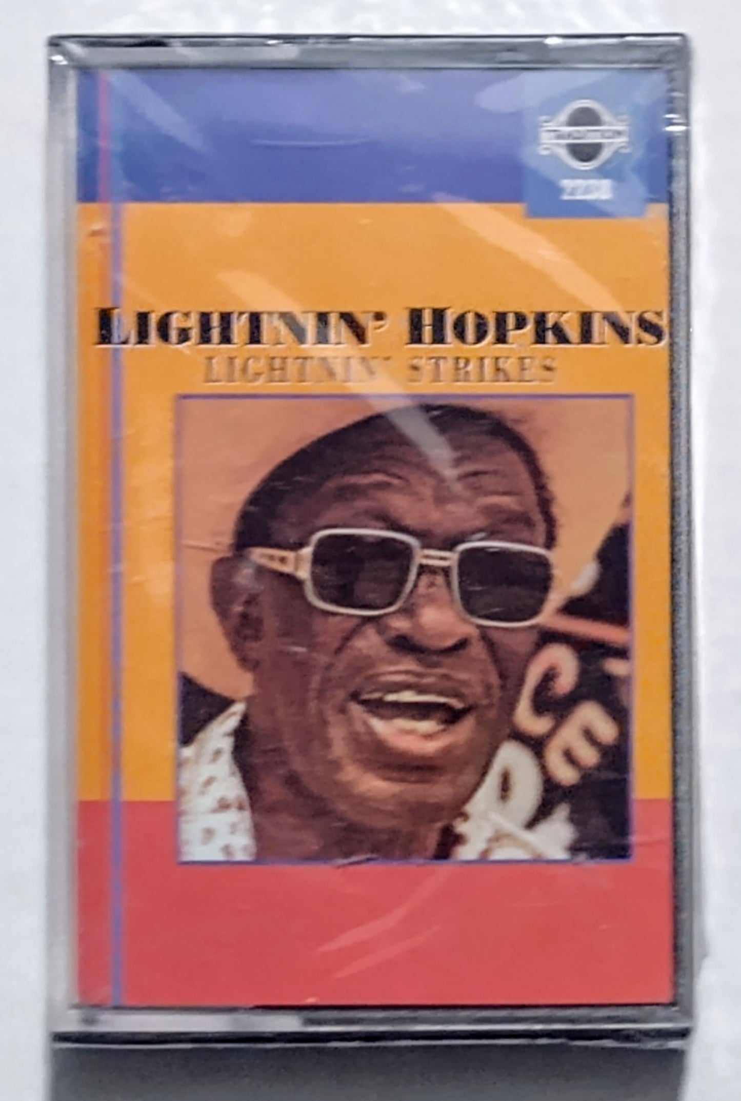 Lightnin’ Hopkins - “Lightnin’ Strikes” - CASSETTE TAPE M/M (Sealed)