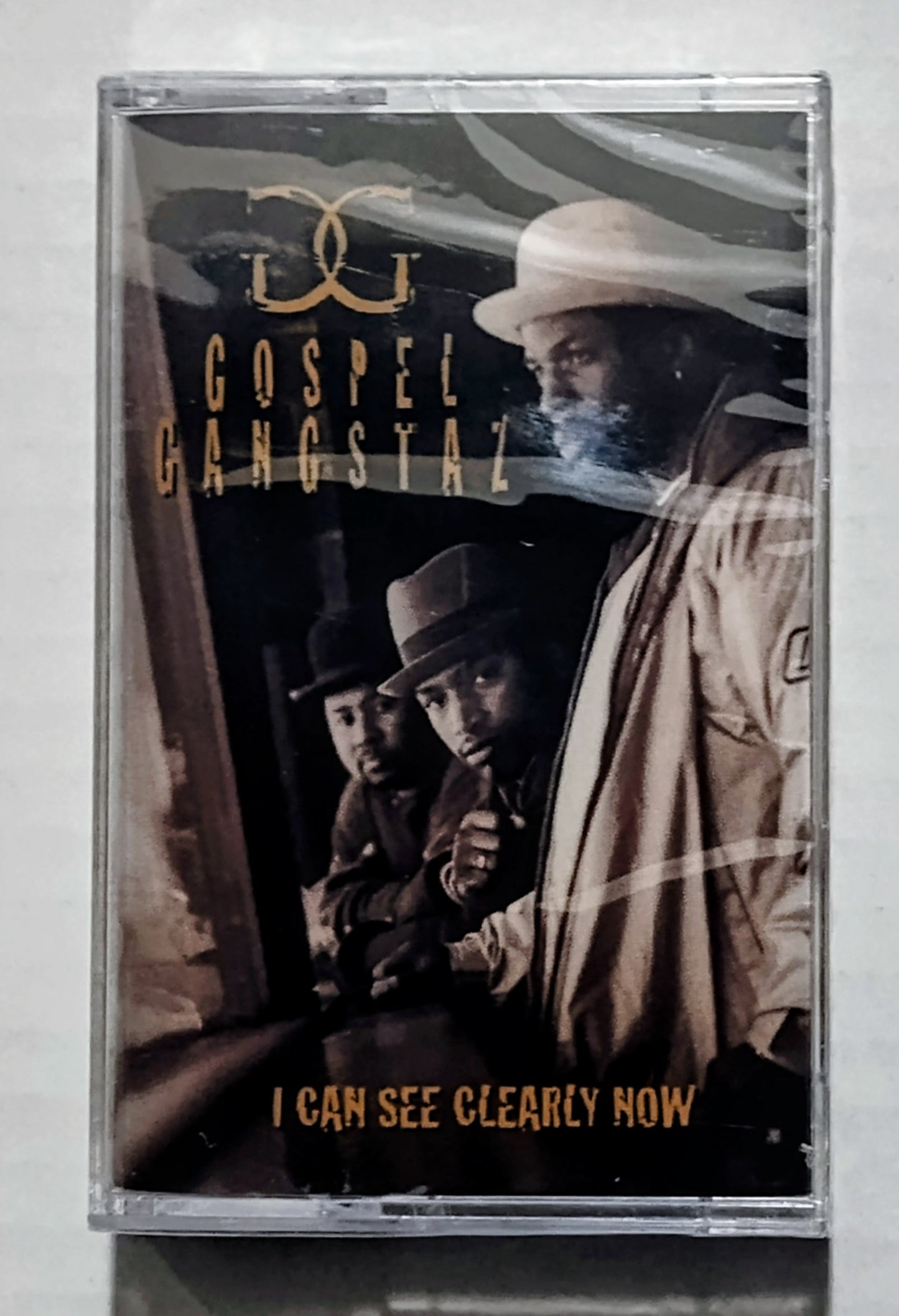 Gospel Gangstaz - “I Can See Clearly Now” - CASSETTE TAPE M/VG+ (Sealed; it appears the cassette shell somehow has a crack in it, shouldn’t affect play.)