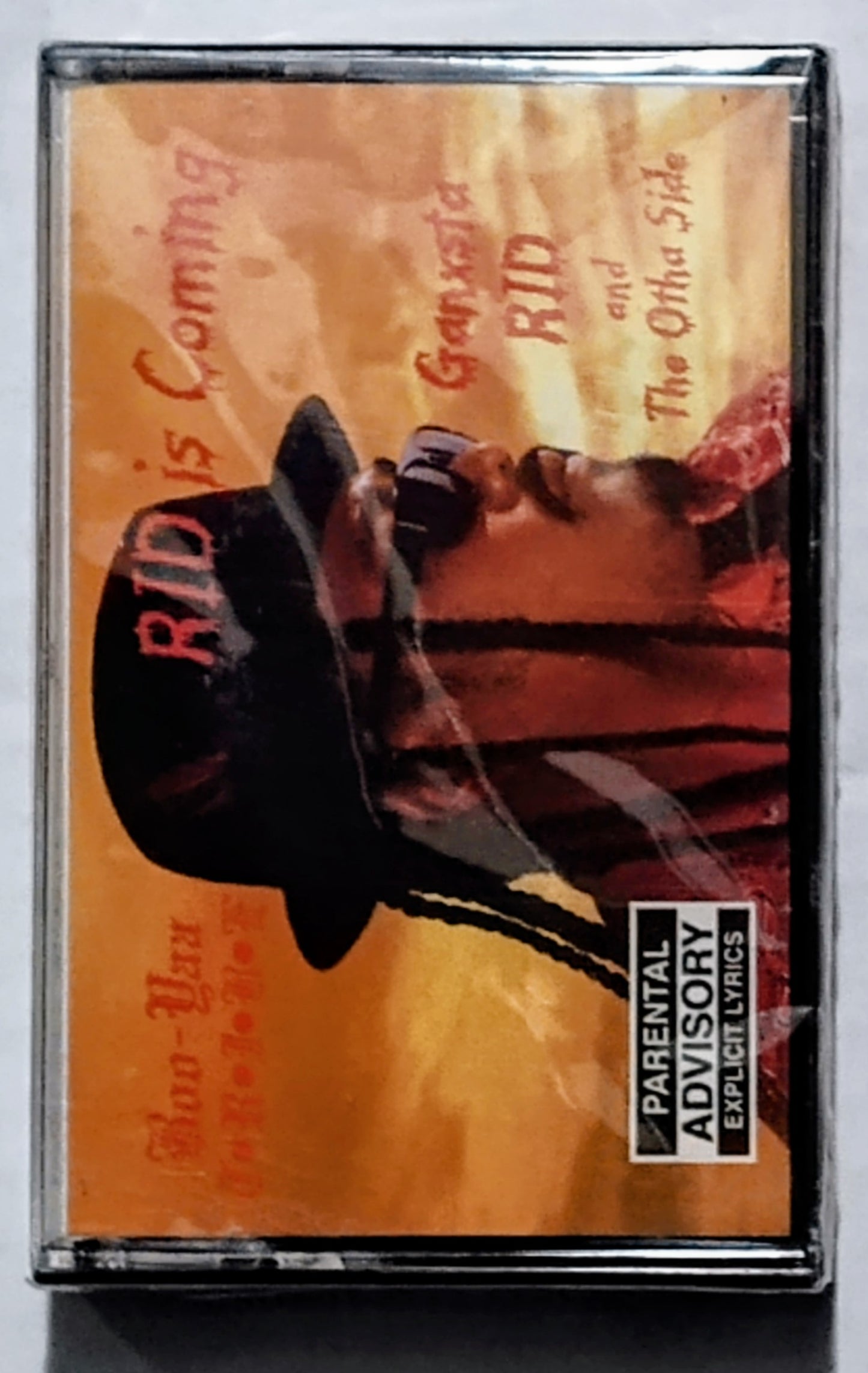Ganxsta Rid And The Other Side - “Rid Is Coming” - CASSETTE TAPE (Single) VG+/M (Sealed; drill hole thru case and bar code)