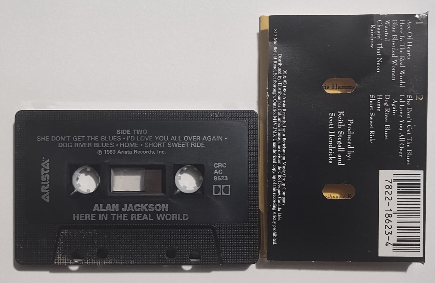Alan Jackson - "Here In The Real World" - CASSETTE TAPE (Canada; black shell; DOLBY) VG+/VG+