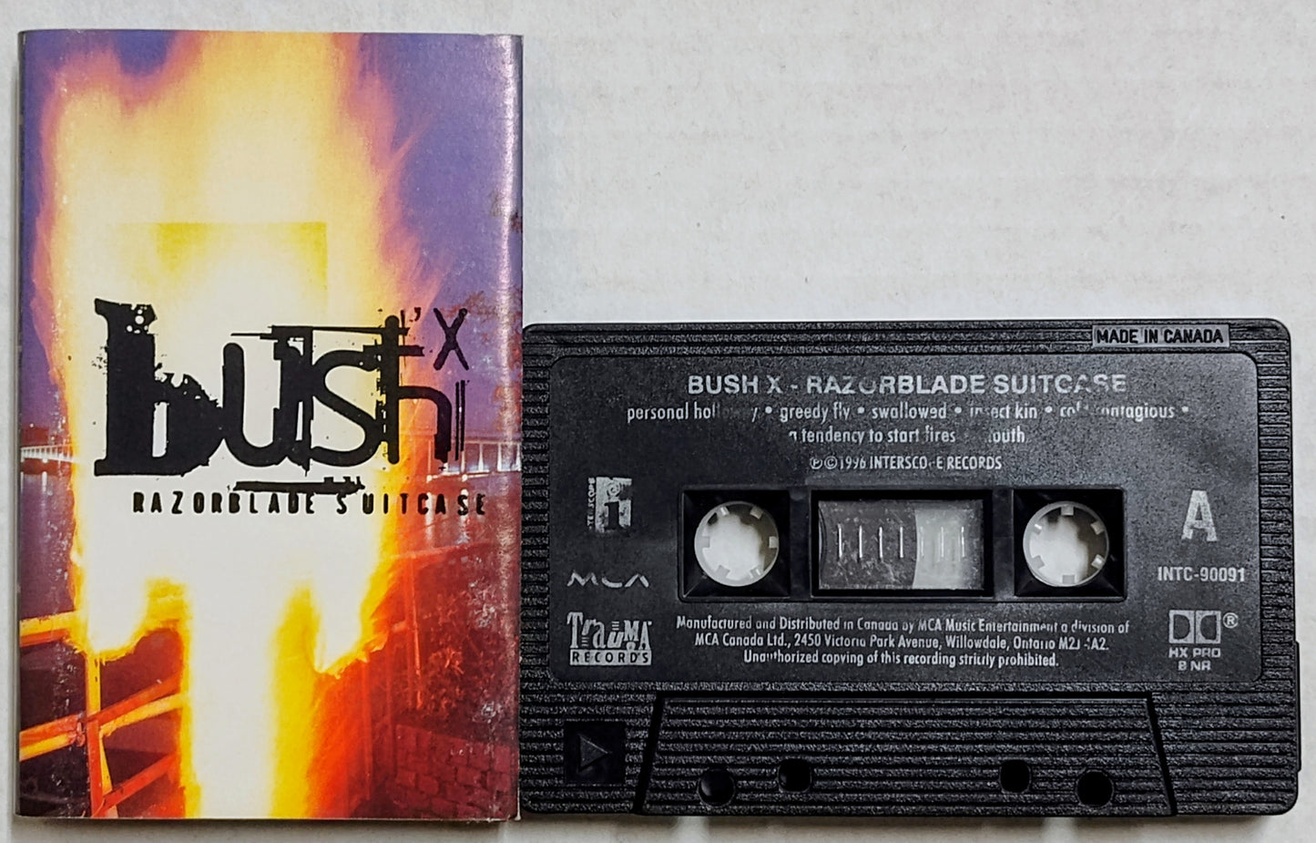 Bush - "Razorblade Suitcase" - CASSETTE TAPE (Canada; Black Shell) VG/VG