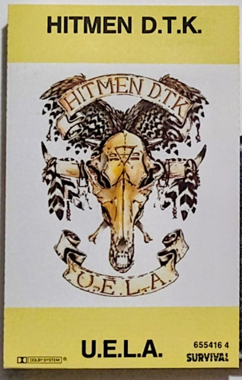 Hitmen D.T.K. - "U.E.L.A."  - CASSETTE TAPE (Australia; black shell; DOLBY Stereo) NM/VG+