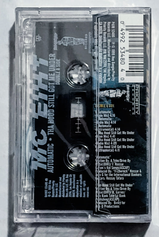 M.C. Eiht - “Automatic/ Tha Hood Still Got Me Under” - CASSETTE TAPE (Maxi Single) NM/M (Sealed; small crack in cover)