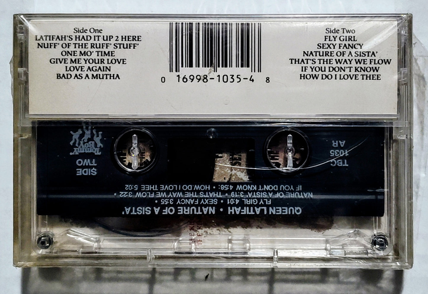 Queen Latifah - “Nature Of A Sista’” - CASSETTE TAPE VG+/M (Sealed; small tear in lower right corner; cellophane on underside has come slightly loose; 2 inch crack in back of case)