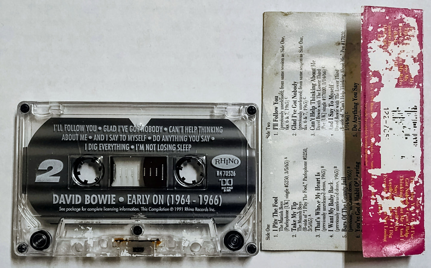 David Bowie - “Early On (1964-1966) - CASSETTE TAPE G+/VG (Water damaged j card, pages not stuck; paint marks on side b from j card)