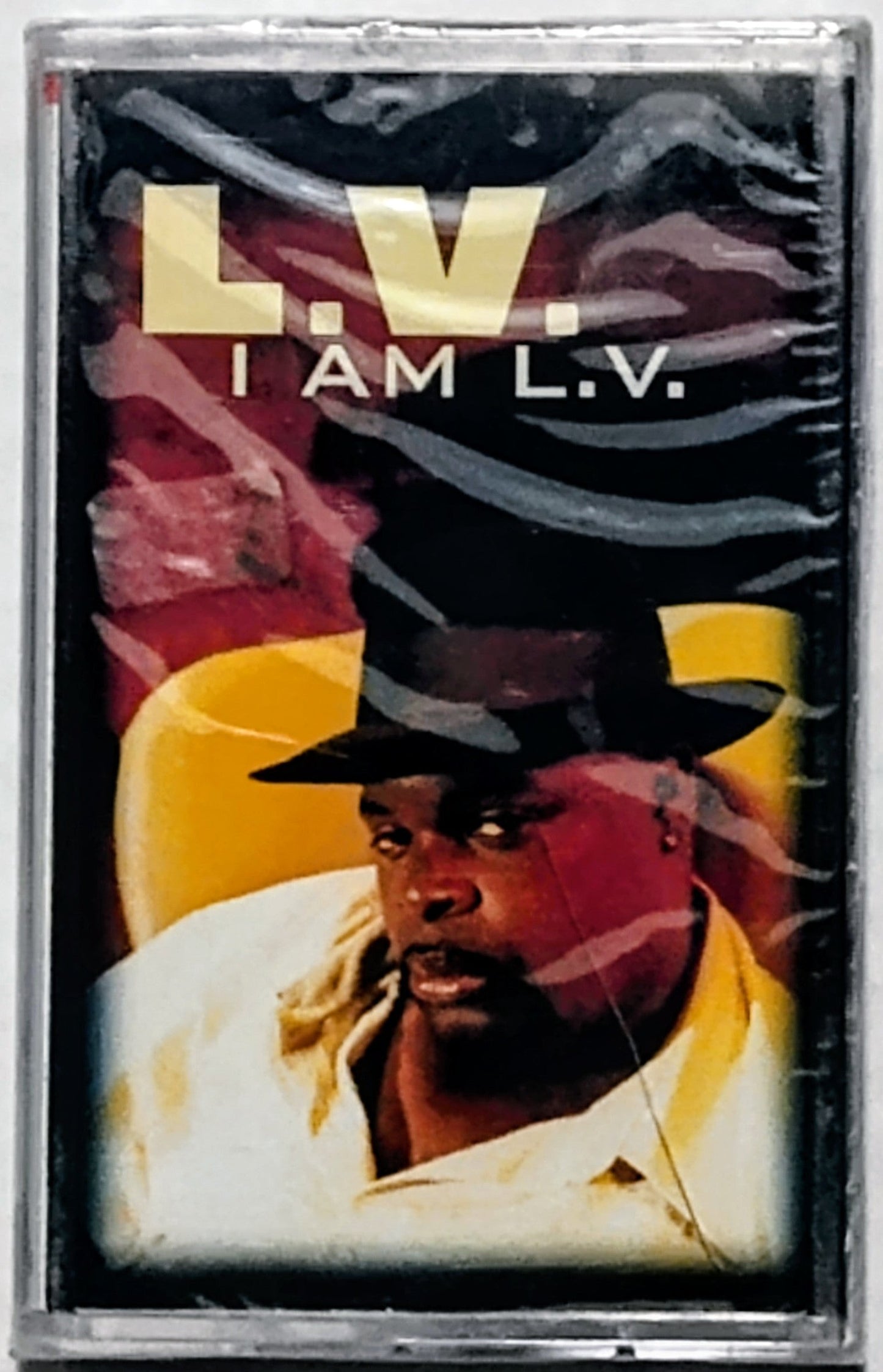 L.V. - "I Am L.V." - CASSETTE TAPE NM/M (Cracks in cover and spine of case)
