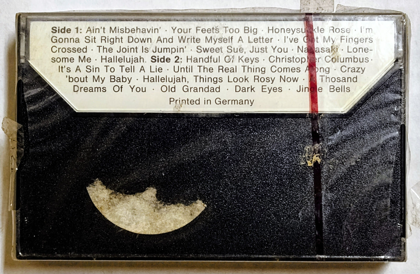 Fats Waller - “20 Golden Greats” - CASSETTE TAPE VG+/M (Sealed; shelf wear; torn cellophane)