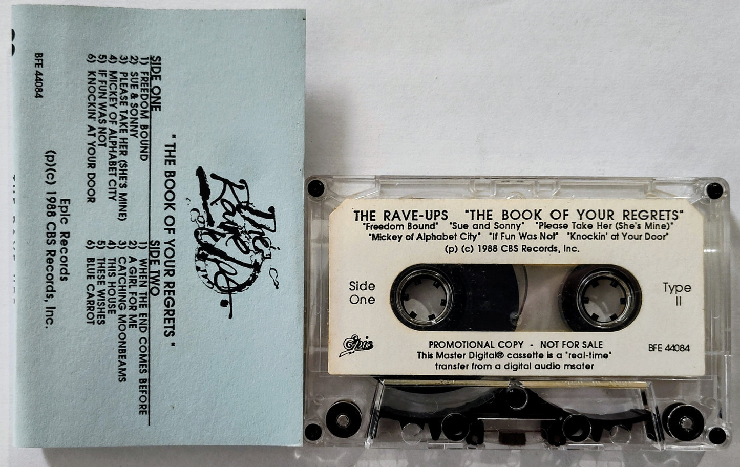 Rave-Ups, The - “The Book Of Your Regrets (Promo)” - CASSETTE TAPE NM/NM