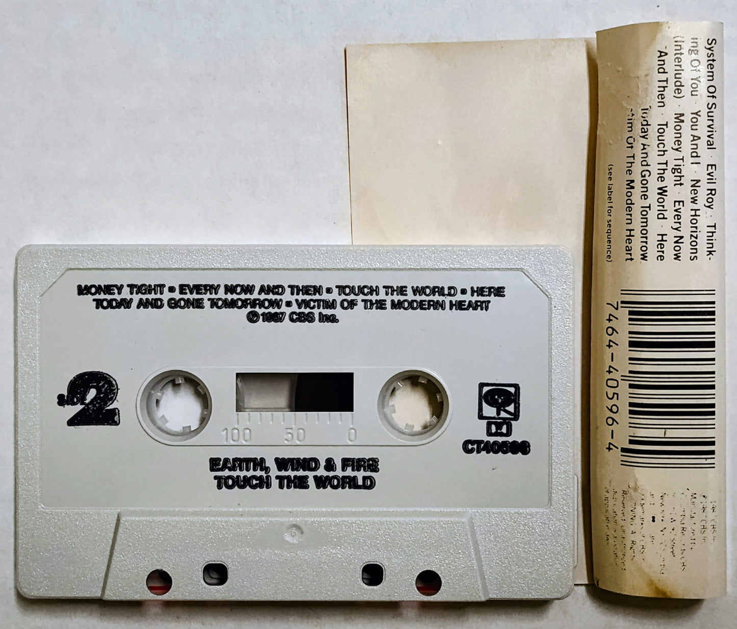 Earth, Wind + Fire - “Touch The World” - CASSETTE TAPE G+/VG+