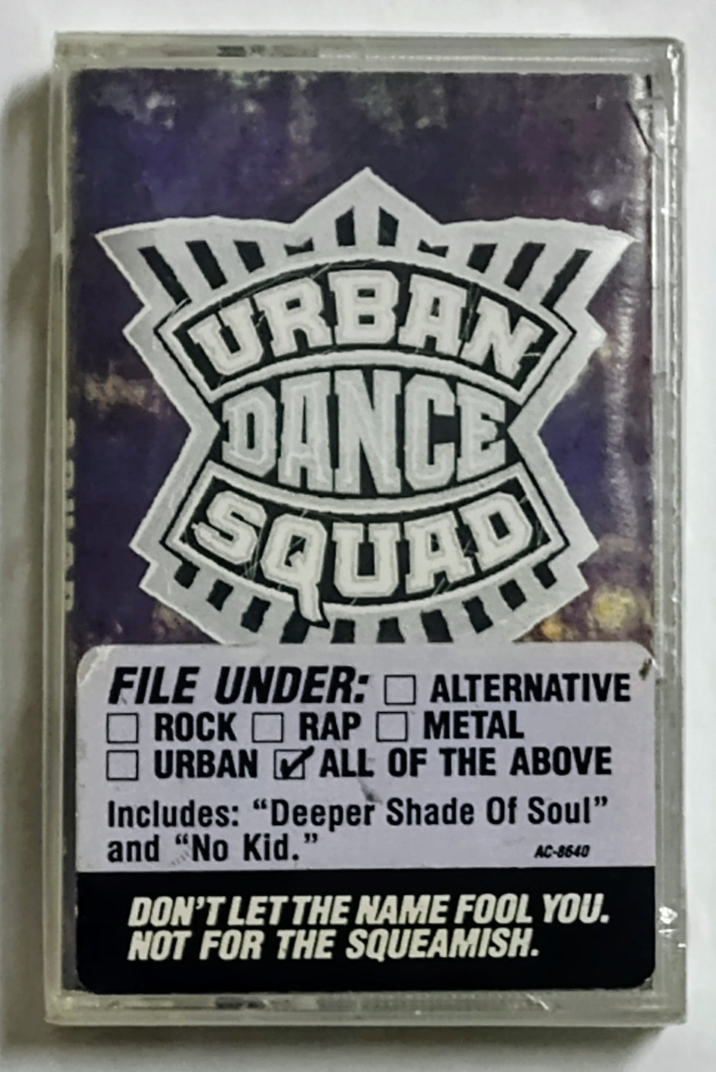 Urban Dance Squad - “Mental Floss” - CASSETTE TAPE VG+/M (Sealed; heavy wear; drill hole in spine; cracked case)