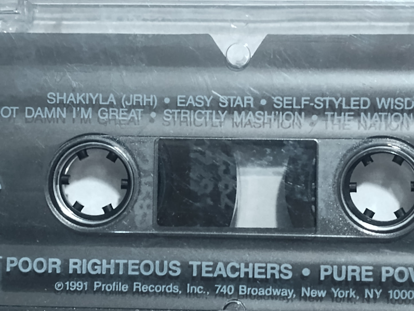 Poor Righteous Teachers - “Pure Poverty” - CASSETTE TAPE VG+/VG+ (Tape is not moldy; has an odd pattern printed on it)