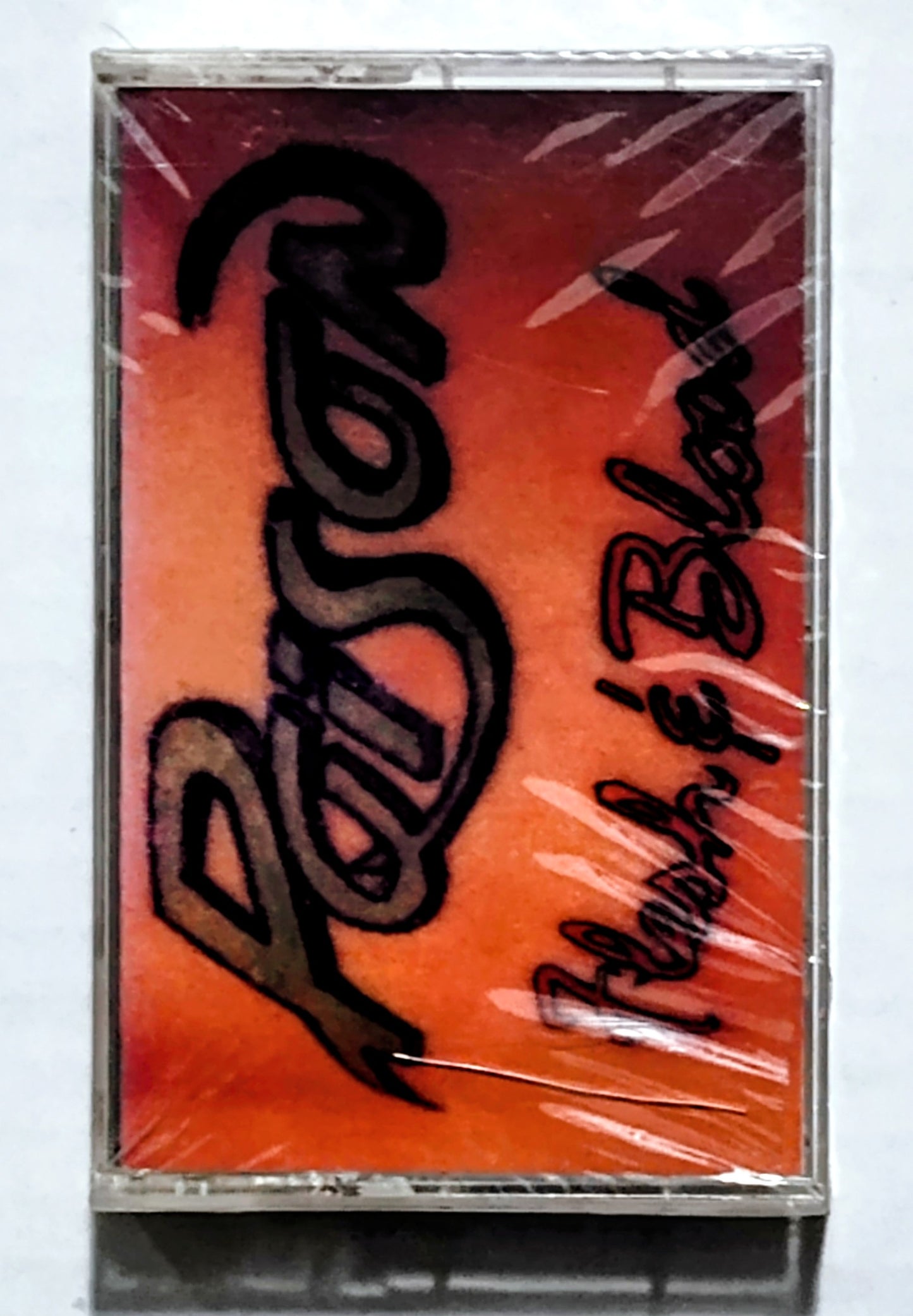 Poison - “Flesh & Blood” - CASSETTE TAPE NM/M (Sealed; large crack in cover; small crack in upper right corner; cellophane slightly ripped in upper left corner)