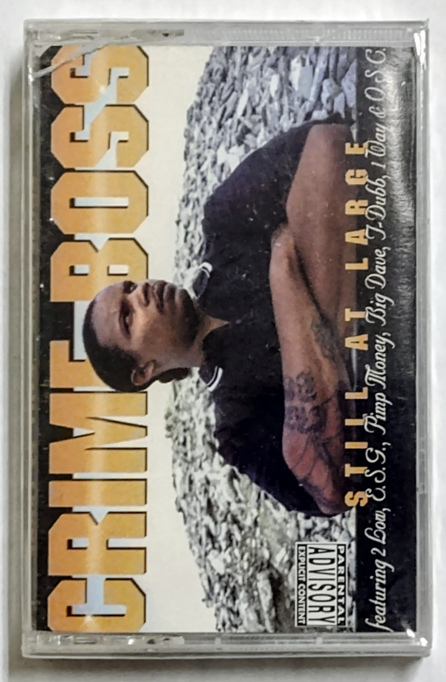 Crime Boss- "Still At Large" - CASSETTE TAPE NM/M (Sealed; cracked case)