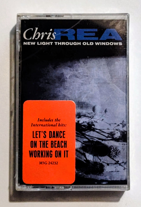 Chris Rea - "New Light Through Old Windows" - CASSETTE TAPE (DOLBY) NM/M (Sealed; crack in spine)