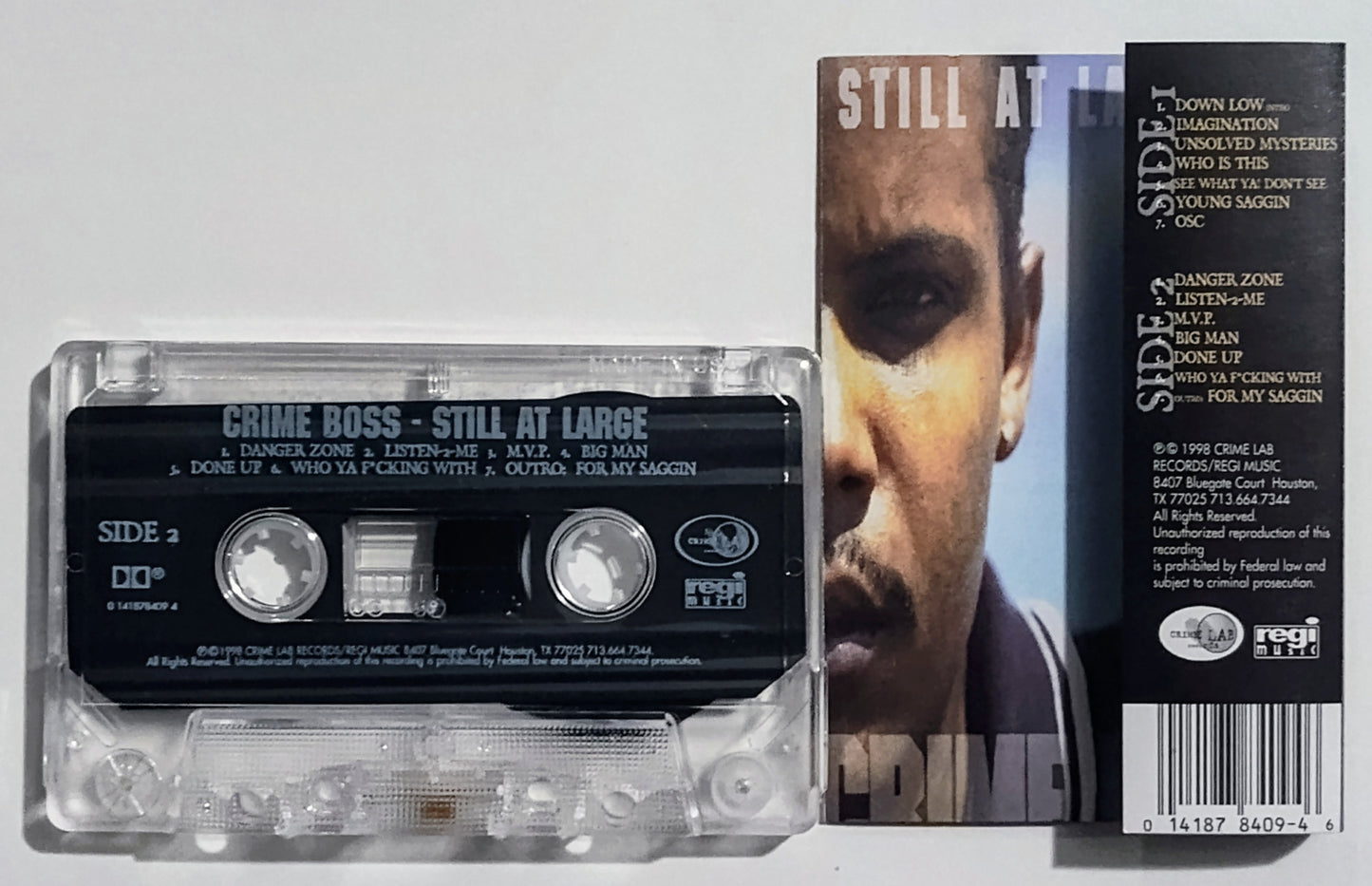 Crime Boss- "Still At Large" - CASSETTE TAPE NM/NM