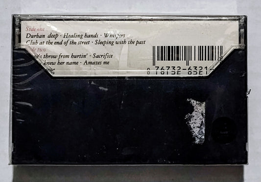 Elton John - “Sleeping With The Past” - CASSETTE TAPE NM/M (Sealed with hype sticker; some kind of weird cut on underside of case)