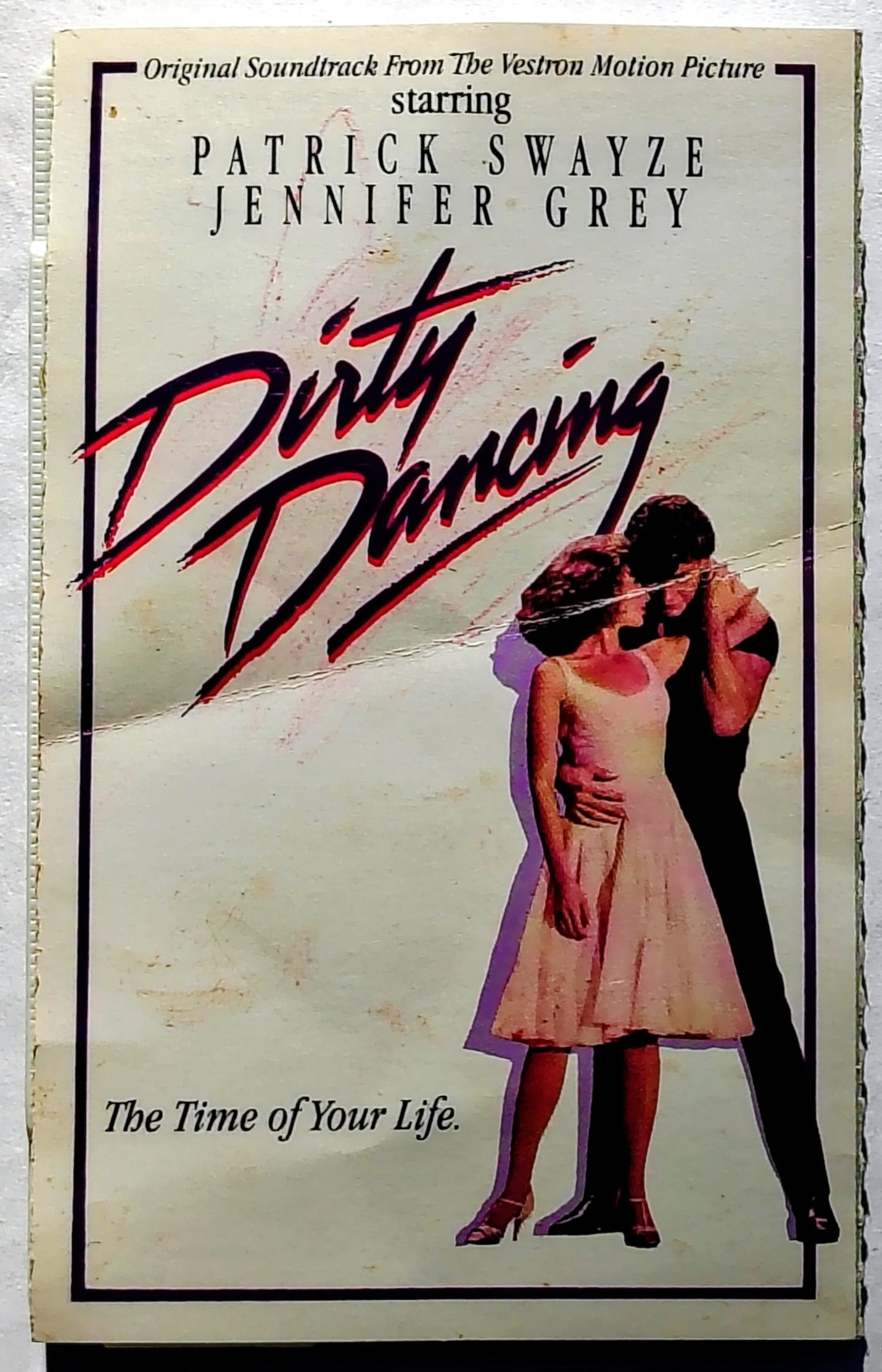 Various Artists - “Dirty Dancing Soundtrack” - CASSETTE TAPE BMG) POOR/VG+ (Damaged j-card: only includes cover section; Actual version not listed on Discogs)