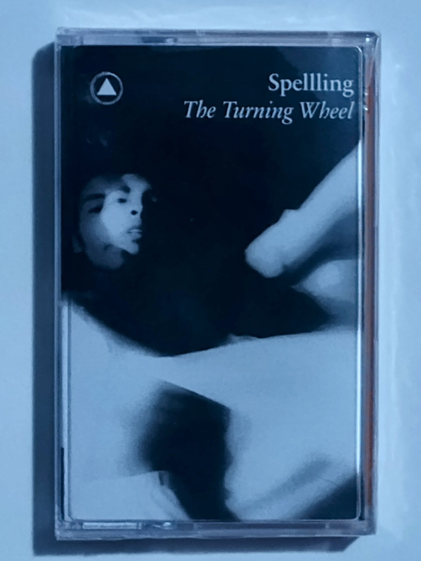 Spellling - "The Turning Wheel" - CASSETTE TAPE (Orange Shell) M/M (Sealed)