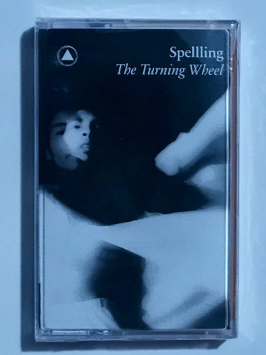 Spellling - "The Turning Wheel" - CASSETTE TAPE (Orange Shell) M/M (Sealed)