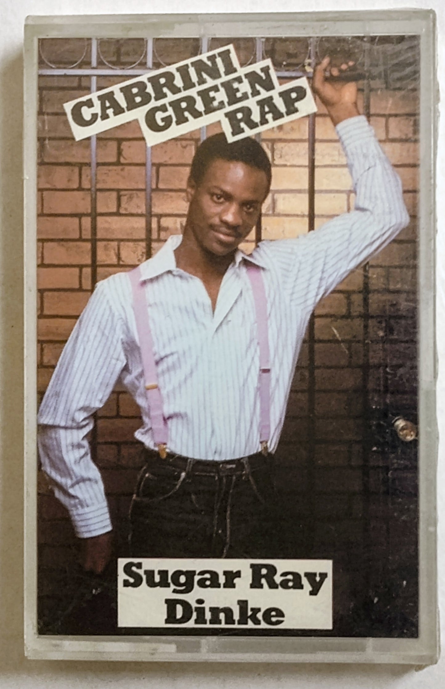 Sugar Ray Dinke - “Cabrini Green Rap” - CASSETTE TAPE (Single) NM/M (Sealed; small tears in cellophane; shelf wear) *❄️*[Chicago, IL]
