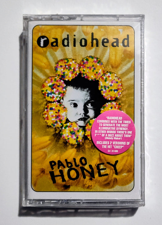 Radiohead - "Pablo Honey" - CASSETTE TAPE (DOLBY HX PRO) NM/M (Sealed w/ hype sticker; Drill hole in upper spine; scratchy cellophane)